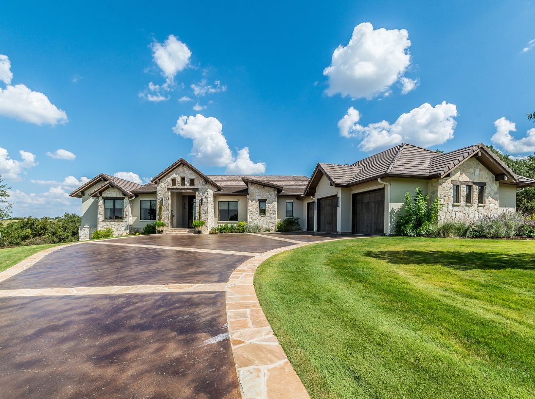 stone driveway of large house